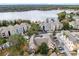 Aerial view showcasing community lakefront location and building exteriors at 3433 Soho St # 204, Orlando, FL 32835