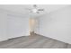 Bedroom with double doors leading to another room at 3433 Soho St # 204, Orlando, FL 32835