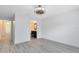 Bedroom with hardwood floors and access to bathroom at 3433 Soho St # 204, Orlando, FL 32835