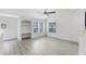 Bright and airy bonus room with built-in shelving at 3433 Soho St # 204, Orlando, FL 32835