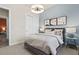 Charming bedroom with a full bed and modern decor at 5190 Foothills Preserve Loop, Mount Dora, FL 32757