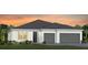 One-story home with gray roof, white walls, and two-car garage at 5190 Foothills Preserve Loop, Mount Dora, FL 32757