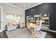 Bright office with large window, built-in shelving, and workspace at 5190 Foothills Preserve Loop, Mount Dora, FL 32757