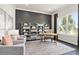 Bright office with large window, built-in shelving, and workspace at 5190 Foothills Preserve Loop, Mount Dora, FL 32757