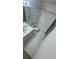 Clean bathroom with bathtub, toilet and sink at 5500 Metrowest Blvd # 101, Orlando, FL 32811