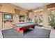 Relaxing game room with pool table and comfortable seating at 5500 Metrowest Blvd # 101, Orlando, FL 32811
