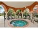 Relaxing hot tub with covered seating area at 5500 Metrowest Blvd # 101, Orlando, FL 32811