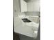 Kitchen island with white countertop and double sink at 5500 Metrowest Blvd # 101, Orlando, FL 32811
