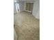 Living room with tile floor and neutral colored walls at 5500 Metrowest Blvd # 101, Orlando, FL 32811