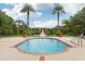 Smaller community pool with lounge chairs at 5500 Metrowest Blvd # 101, Orlando, FL 32811