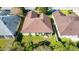 Aerial view of a house and surrounding neighborhood at 5649 Magnolia Bloom Ter, Oviedo, FL 32765