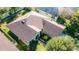 Aerial view of house showing roof and landscaping at 5649 Magnolia Bloom Ter, Oviedo, FL 32765