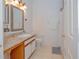 Bathroom with single vanity, toilet, and shower at 5649 Magnolia Bloom Ter, Oviedo, FL 32765