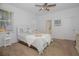 Spacious bedroom with ceiling fan and ensuite bathroom access at 5649 Magnolia Bloom Ter, Oviedo, FL 32765