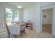 Cozy breakfast nook with a table and chairs, overlooking the backyard at 5649 Magnolia Bloom Ter, Oviedo, FL 32765