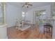 Charming dining room with hardwood floors and access to a patio at 5649 Magnolia Bloom Ter, Oviedo, FL 32765