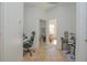 Hallway with tile flooring and access to other rooms at 5649 Magnolia Bloom Ter, Oviedo, FL 32765