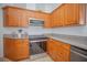 Modern kitchen with stainless steel appliances and ample cabinetry at 5649 Magnolia Bloom Ter, Oviedo, FL 32765