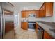 Well-equipped kitchen featuring stainless steel appliances at 5649 Magnolia Bloom Ter, Oviedo, FL 32765