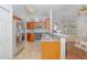 Modern kitchen with stainless steel appliances and granite counters at 5649 Magnolia Bloom Ter, Oviedo, FL 32765