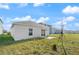 Single-story home with grassy backyard at 640 Reggie Rd, Winter Haven, FL 33884