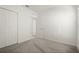 Simple bedroom with carpet and double doors at 640 Reggie Rd, Winter Haven, FL 33884