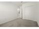 Well-lit bedroom with carpet and closet at 640 Reggie Rd, Winter Haven, FL 33884