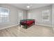 Bedroom with lots of light, wood-look floors, and a ceiling fan at 718 N Grandview Ave, Daytona Beach, FL 32118