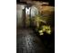 Garage exterior with palm tree and decorative outdoor lighting at 7760 Windbreak Rd, Orlando, FL 32819