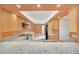 Well-lit kitchen with wooden cabinetry, granite countertops, and stainless steel appliances at 7760 Windbreak Rd, Orlando, FL 32819