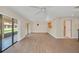 Living room with tile floors and ceiling fan at 7760 Windbreak Rd, Orlando, FL 32819