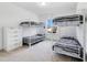 Bedroom with bunk beds and ample closet space at 8298 Lookout Pointe Dr, Windermere, FL 34786