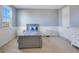 Serene bedroom with a twin bed and neutral color palette at 8298 Lookout Pointe Dr, Windermere, FL 34786