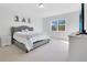 Main bedroom with a king-size bed and ample space at 8298 Lookout Pointe Dr, Windermere, FL 34786