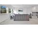 Bright bonus room featuring a sectional sofa and mounted TV at 8298 Lookout Pointe Dr, Windermere, FL 34786