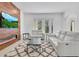Open living room showcasing a fireplace and large TV at 8298 Lookout Pointe Dr, Windermere, FL 34786