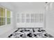 White built-in shelving and Mickey Mouse rug at 8298 Lookout Pointe Dr, Windermere, FL 34786
