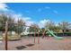 Community playground with swings and a slide at 8298 Lookout Pointe Dr, Windermere, FL 34786