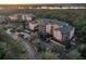 Aerial view of building and surrounding parking lot at 9051 Treasure Trove Ln # 301, Kissimmee, FL 34747