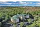 Aerial view of building with surrounding green space at 9051 Treasure Trove Ln # 301, Kissimmee, FL 34747