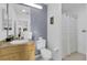 Clean bathroom with a shower/tub combo and wood vanity at 9051 Treasure Trove Ln # 301, Kissimmee, FL 34747