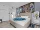 Main bedroom with large bed, themed decor, and hardwood floors at 9051 Treasure Trove Ln # 301, Kissimmee, FL 34747