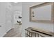 Bright and airy entryway with wood-look floors at 9051 Treasure Trove Ln # 301, Kissimmee, FL 34747