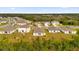 Aerial view of homes showcasing a community setting at 9331 Revere Ave, Leesburg, FL 34788