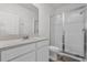 Clean bathroom with single vanity and shower at 9331 Revere Ave, Leesburg, FL 34788