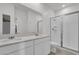 Modern bathroom with double vanity and shower at 9331 Revere Ave, Leesburg, FL 34788