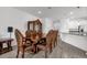 Formal dining room with large table and matching chairs at 9331 Revere Ave, Leesburg, FL 34788
