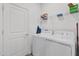 Convenient laundry room with washer and dryer at 9331 Revere Ave, Leesburg, FL 34788