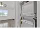 Stackable washer and dryer in a bright, clean laundry room at 9331 Revere Ave, Leesburg, FL 34788