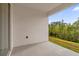 Private patio with a view of the natural landscape at 9331 Revere Ave, Leesburg, FL 34788